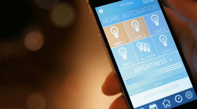 a cell phone with smart light bulb app open