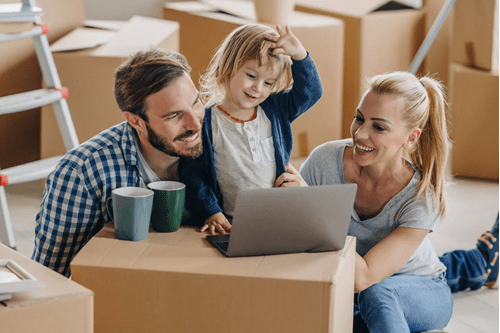 family with moving boxes